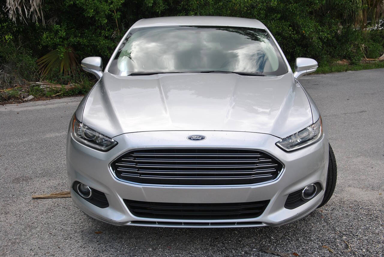 2014 Ford Fusion Hybrid for sale at Elite Auto Specialties LLC in Deland, FL