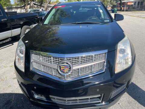 2012 Cadillac SRX for sale at America Auto Wholesale Inc in Miami FL