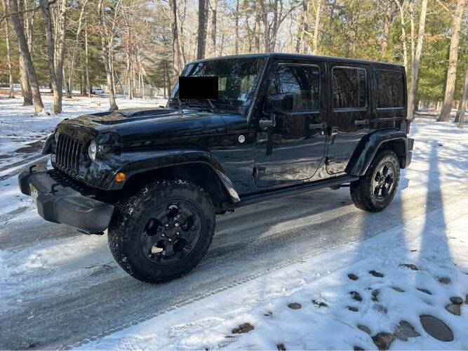 2015 Jeep Wrangler for sale at Classic Car Deals in Cadillac MI