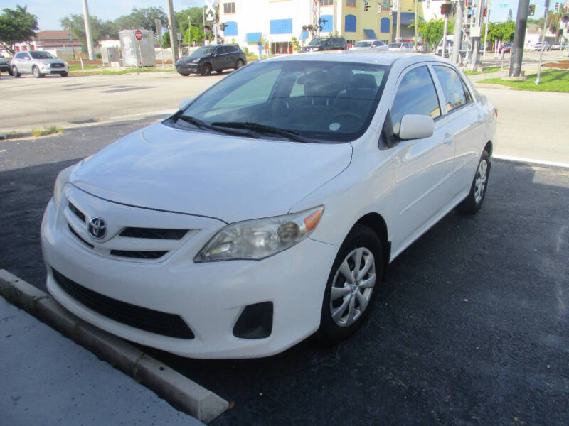 2013 Toyota Corolla for sale at K & V AUTO SALES LLC in Hollywood FL