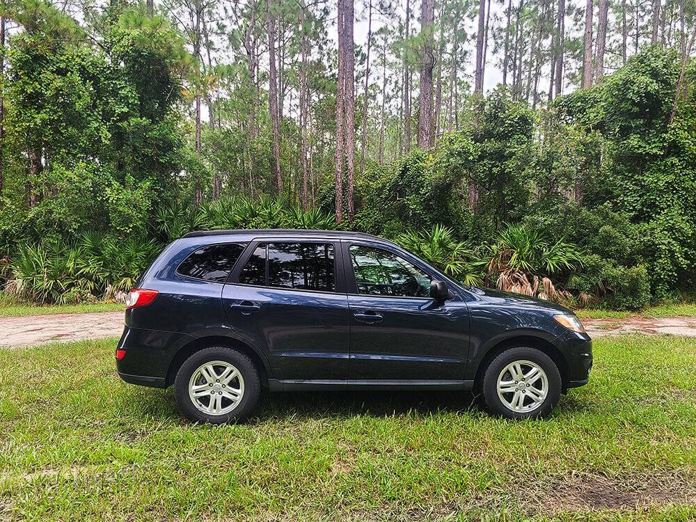 2011 Hyundai SANTA FE for sale at Flagler Auto Center in Bunnell, FL