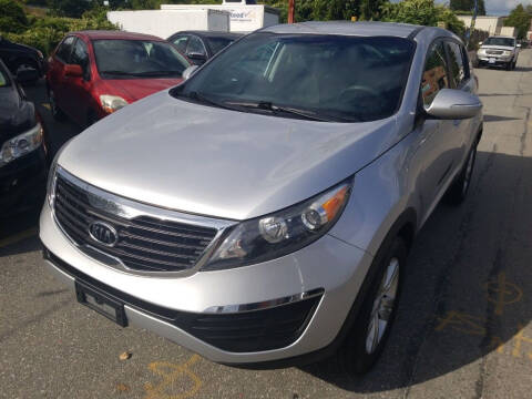 2012 Kia Sportage for sale at Howe's Auto Sales in Lowell MA