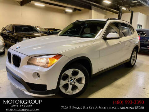2015 BMW X1 for sale at Motorgroup LLC in Scottsdale AZ