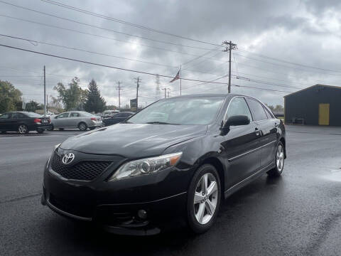 2011 Toyota Camry for sale at Queen City Auto House LLC in West Chester OH