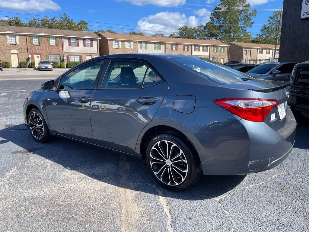 2014 Toyota Corolla for sale at INTEGRITY AUTO in Dothan, AL