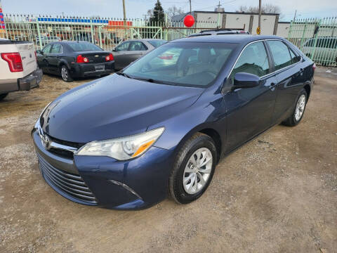 2015 Toyota Camry for sale at DEALER CONNECTED INC in Detroit MI