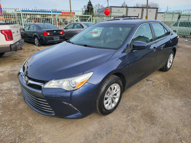 2015 Toyota Camry for sale at DEALER CONNECTED INC in Detroit MI