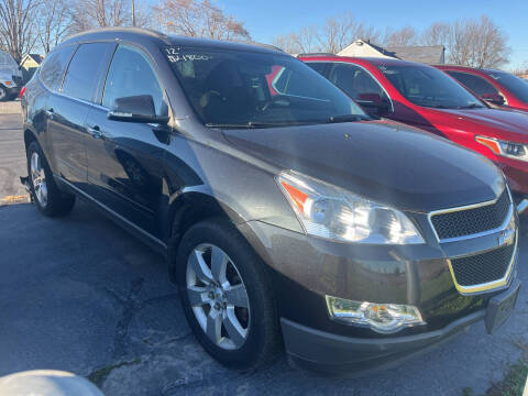 2012 Chevrolet Traverse for sale at HEDGES USED CARS in Carleton MI