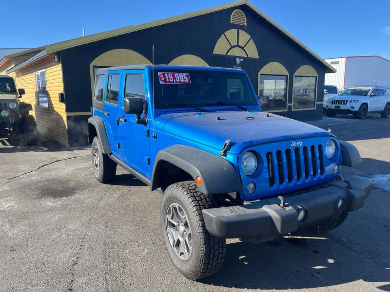 2015 Jeep Wrangler Unlimited for sale at BELOW BOOK AUTO SALES in Idaho Falls ID