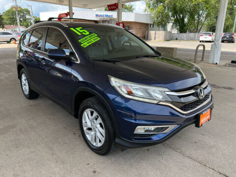 2015 Honda CR-V for sale at REVOLUTION MOTORS LLC in Waukegan IL