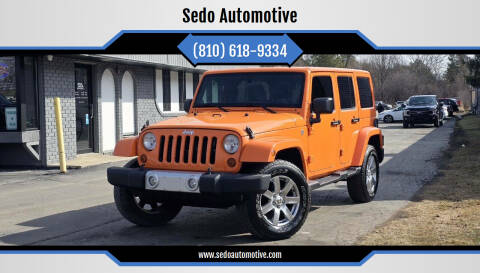 2012 Jeep Wrangler Unlimited for sale at Sedo Automotive in Davison MI