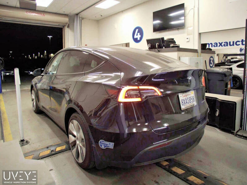 Used 2021 Tesla Model Y Long Range with VIN 5YJYGAEE9MF213464 for sale in Edmonds, WA