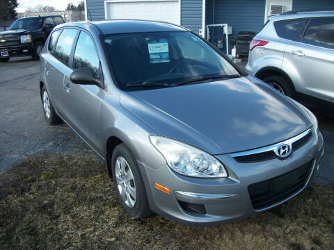 2011 Hyundai Elantra Touring for sale at USED CAR FACTORY in Janesville WI