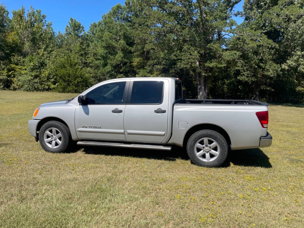 2013 Nissan Titan for sale at Russell Brothers Auto Sales in Tyler, TX