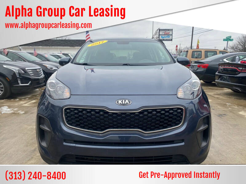 2017 Kia Sportage for sale at Alpha Group Car Leasing in Redford MI