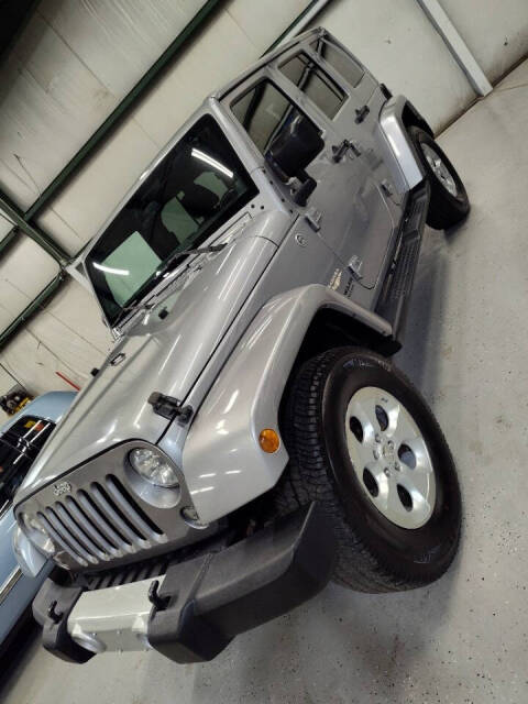 2014 Jeep Wrangler Unlimited for sale at THOMPSON MOTOR GROUP LLC in Hudsonville, MI