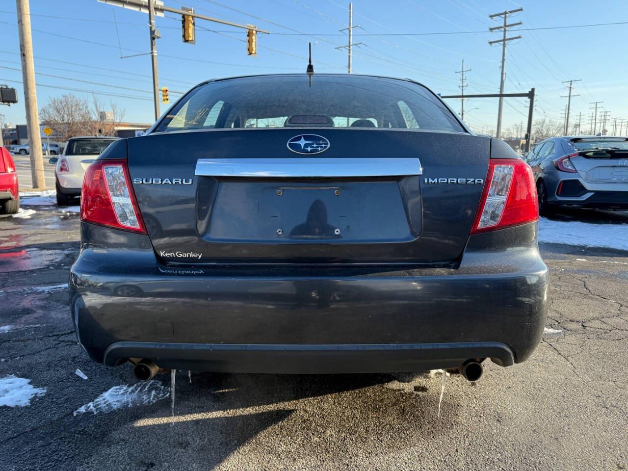 2009 Subaru Impreza for sale at AVS AUTO GROUP LLC in CLEVELAND, OH