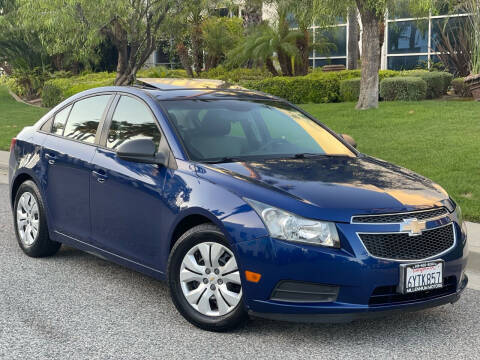 2013 Chevrolet Cruze for sale at MILLENNIUM MOTORS in Van Nuys CA