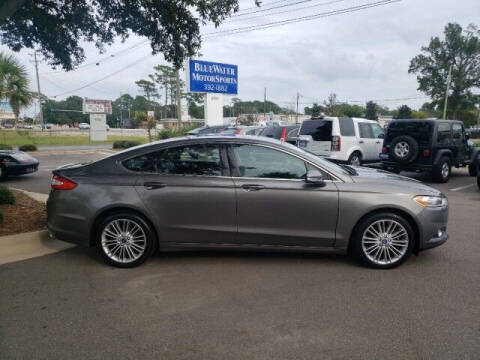 2014 Ford Fusion for sale at BlueWater MotorSports in Wilmington NC