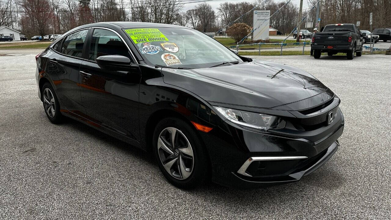 2021 Honda Civic for sale at North Ridge Auto Center LLC in Madison, OH