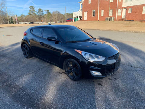 2012 Hyundai Veloster for sale at First Auto Sales in Winder GA