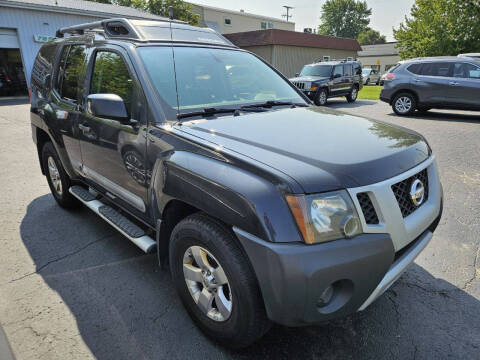 2011 Nissan Xterra for sale at Van Kalker Motors in Grand Rapids MI