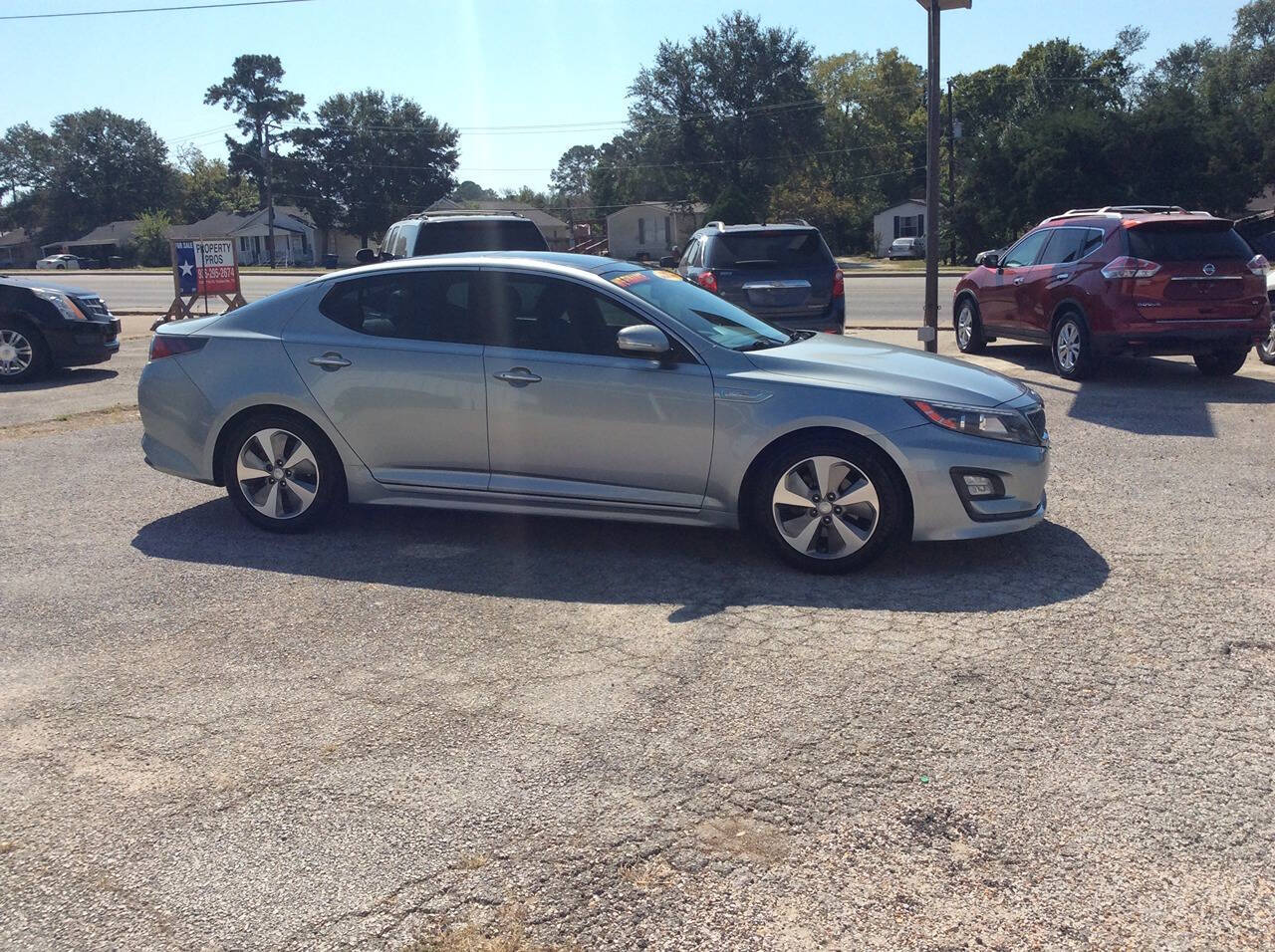 2014 Kia Optima Hybrid for sale at SPRINGTIME MOTORS in Huntsville, TX