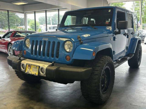 2012 Jeep Wrangler Unlimited for sale at CERTIFIED HEADQUARTERS in Saint James NY