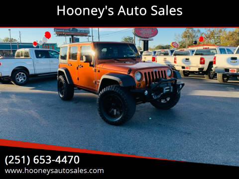 2011 Jeep Wrangler Unlimited for sale at Hooney's Auto Sales in Theodore AL