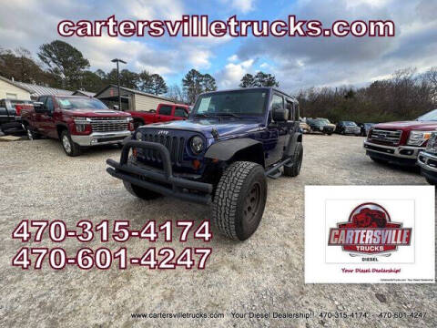 2011 Jeep Wrangler Unlimited for sale at Cartersville Trucks in Cartersville GA