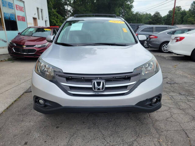 2014 Honda CR-V for sale at DAGO'S AUTO SALES LLC in Dalton, GA