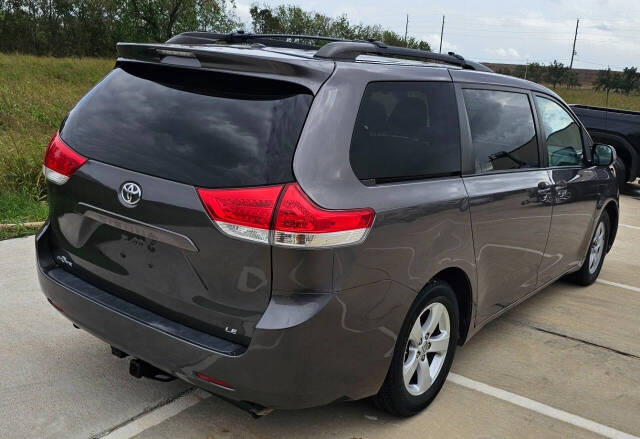 2013 Toyota Sienna for sale at CAR MARKET AUTO GROUP in Sugar Land, TX