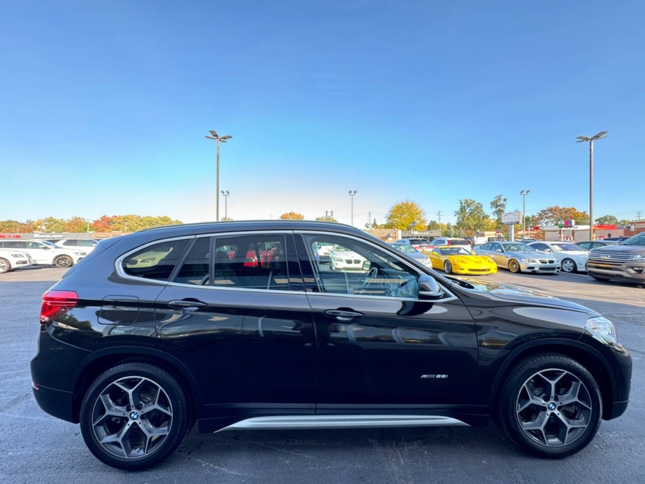 2016 BMW X1 for sale at Opus Motorcars in Utica, MI