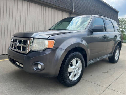 2010 Ford Escape for sale at IMPORTS AUTO GROUP in Akron OH