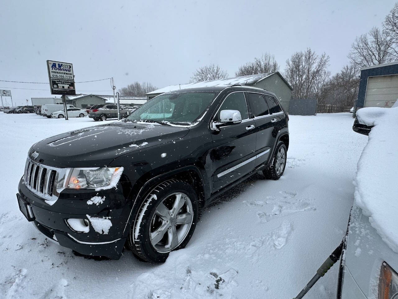 2013 Jeep Grand Cherokee for sale at Platinum Motors in Holland, MI