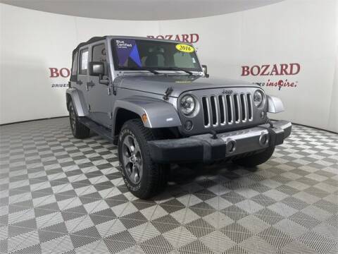 2016 Jeep Wrangler Unlimited for sale at BOZARD FORD in Saint Augustine FL