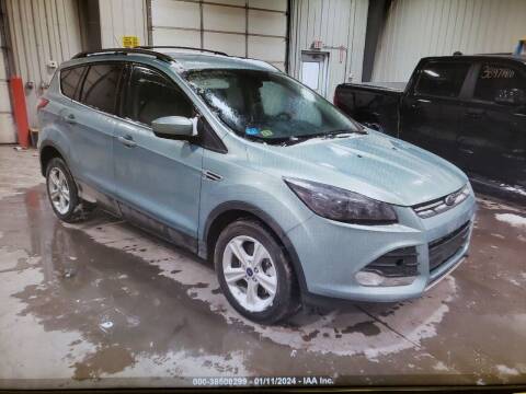 2013 Ford Escape for sale at BERG AUTO MALL & TRUCKING INC in Beresford SD