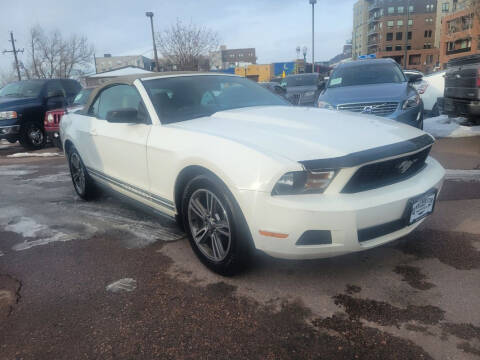 2012 Ford Mustang for sale at BERKENKOTTER MOTORS in Brighton CO