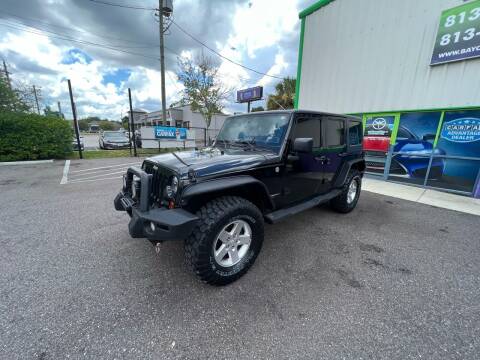 2011 Jeep Wrangler Unlimited for sale at Bay City Autosales in Tampa FL