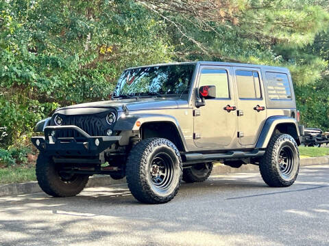 2014 Jeep Wrangler Unlimited for sale at H and S Auto Group in Canton GA