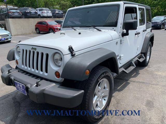 2013 Jeep Wrangler Unlimited for sale at J & M Automotive in Naugatuck CT