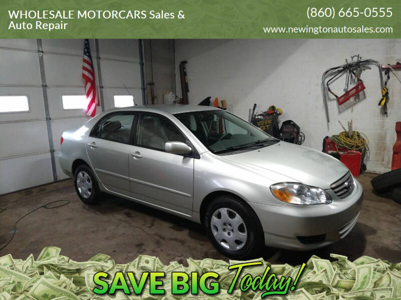 2004 Toyota Corolla for sale at WHOLESALE MOTORCARS Sales & Auto Repair in Newington CT