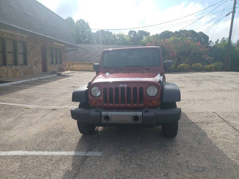 2009 Jeep Wrangler for sale at Star Car in Woodstock GA