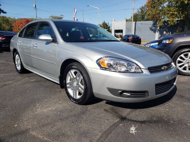 2011 Chevrolet Impala for sale at Auto Shop in Wyoming, MI