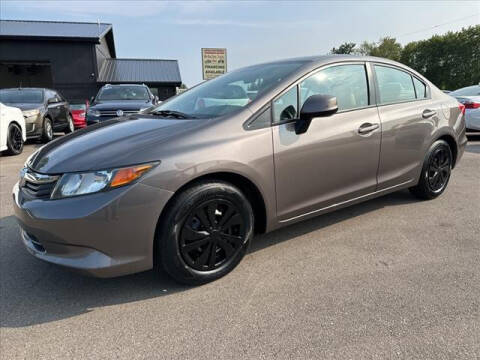 2012 Honda Civic for sale at HUFF AUTO GROUP in Jackson MI