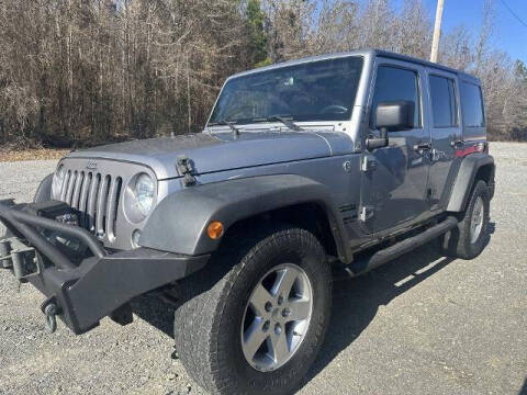 2015 Jeep Wrangler Unlimited for sale at Holt Auto Group in Crossett AR