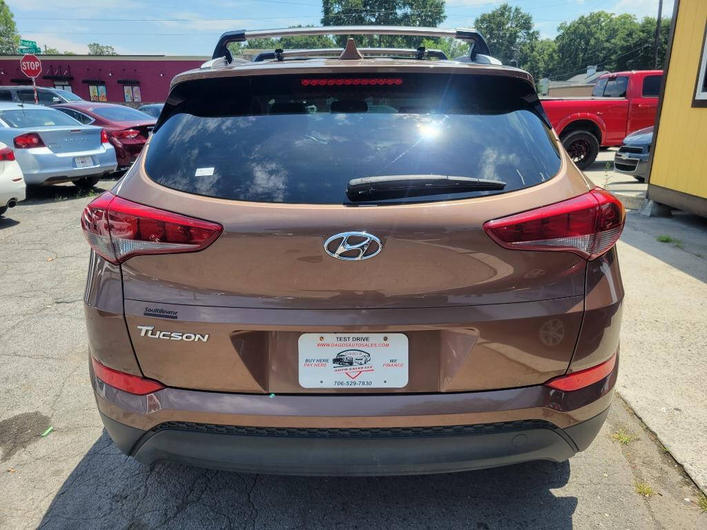 2017 Hyundai TUCSON for sale at DAGO'S AUTO SALES LLC in Dalton, GA