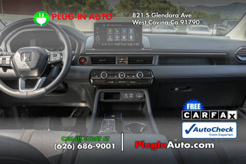 2023 Honda Pilot EX-L w/Rear Captain's Chairs