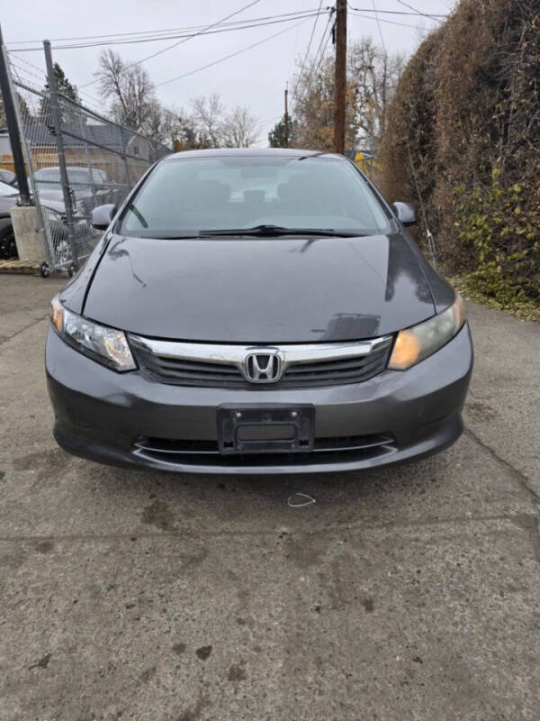 2012 Honda Civic for sale at Queen Auto Sales in Denver CO