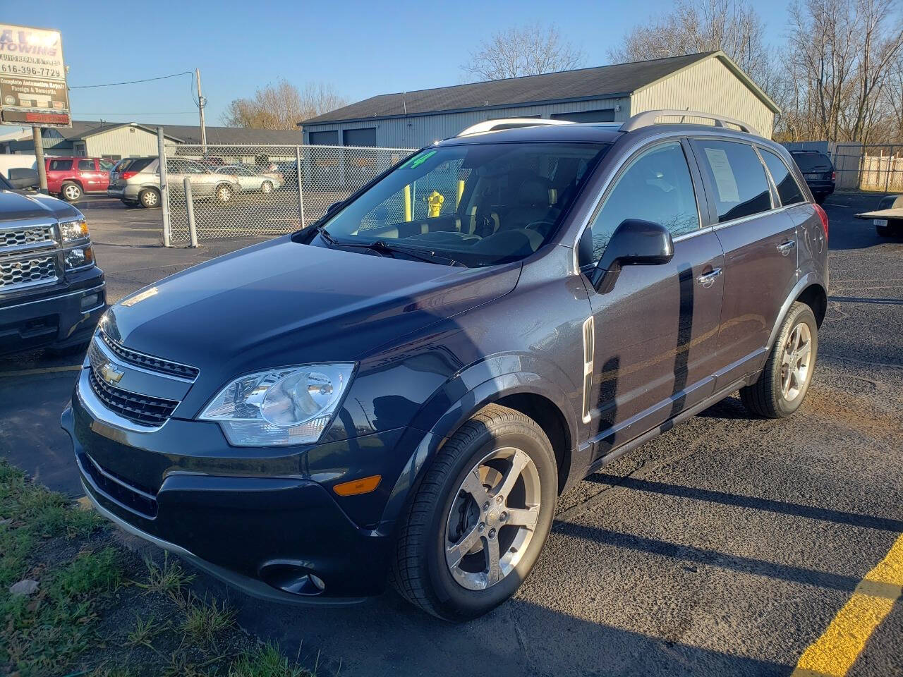 2014 Chevrolet Captiva Sport for sale at Platinum Motors in Holland, MI